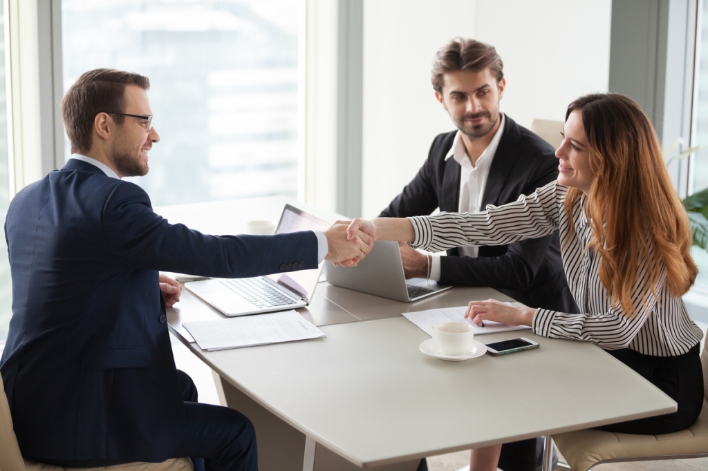 people-shaking-hands-after-negotiation