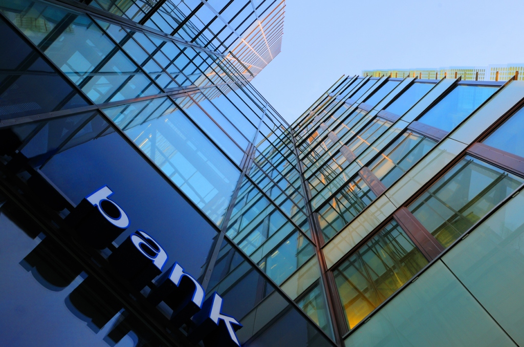 mid-tier-banks-corporate-finance-building-seen-from-below-with-visible-bank-sign